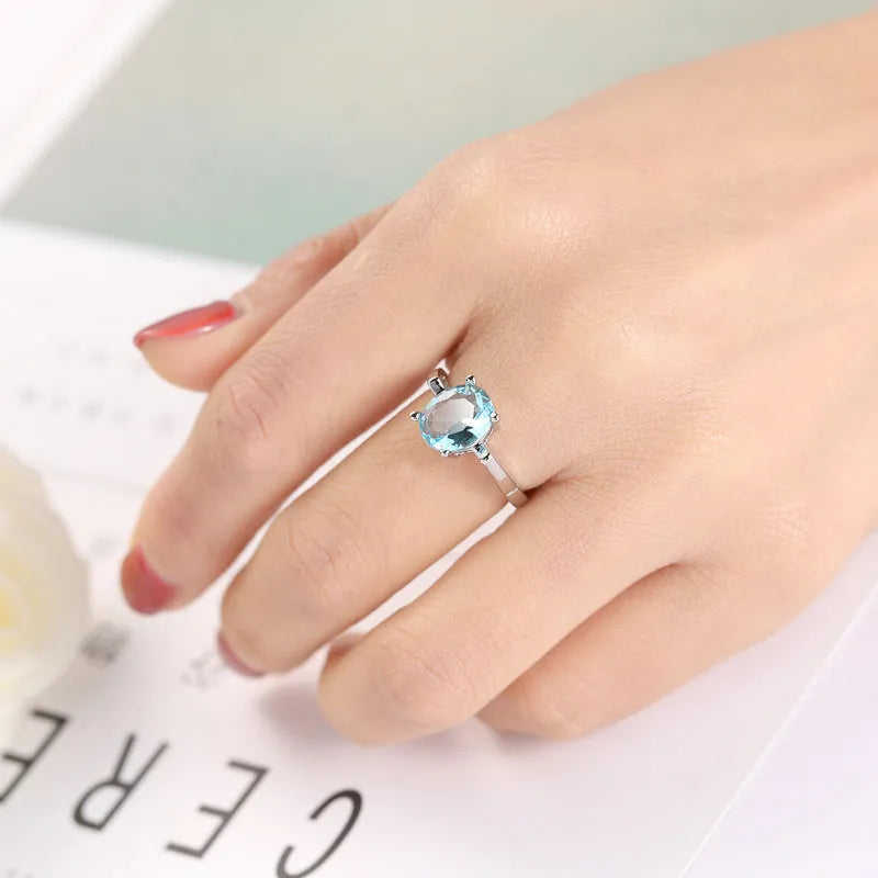 Ocean blue zircon copper ring in simple geometric women's style, sizes 6 to 10
