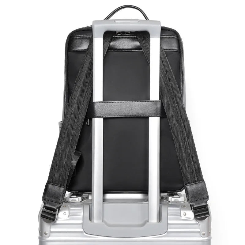 Men's large capacity leather computer backpack with 36-55L storage in black