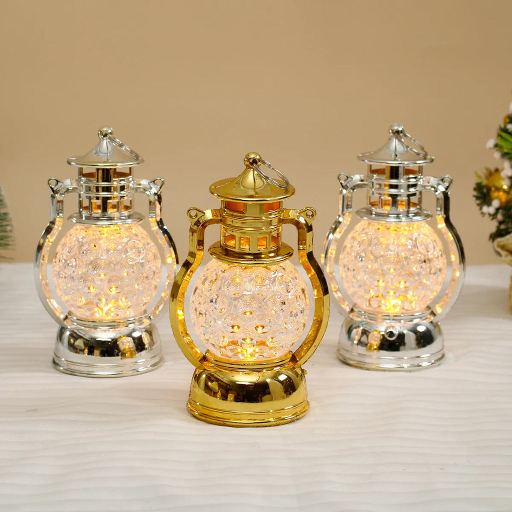 Retro oil lamp style LED night light in gold or silver finish measuring 14.5cm tall