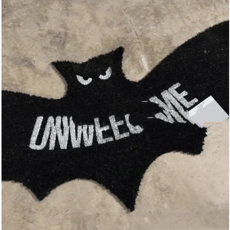 Bat-shaped plastic doormat measuring 80x40 centimetres in bat mat style