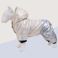 Green waterproof cotton padded dog coat with four-legged design on medium-sized dog