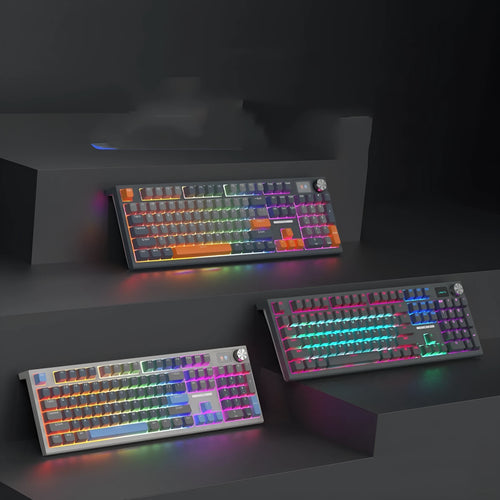 Full-size three-mode mechanical keyboard with ABS casing and Type-C cable on desk