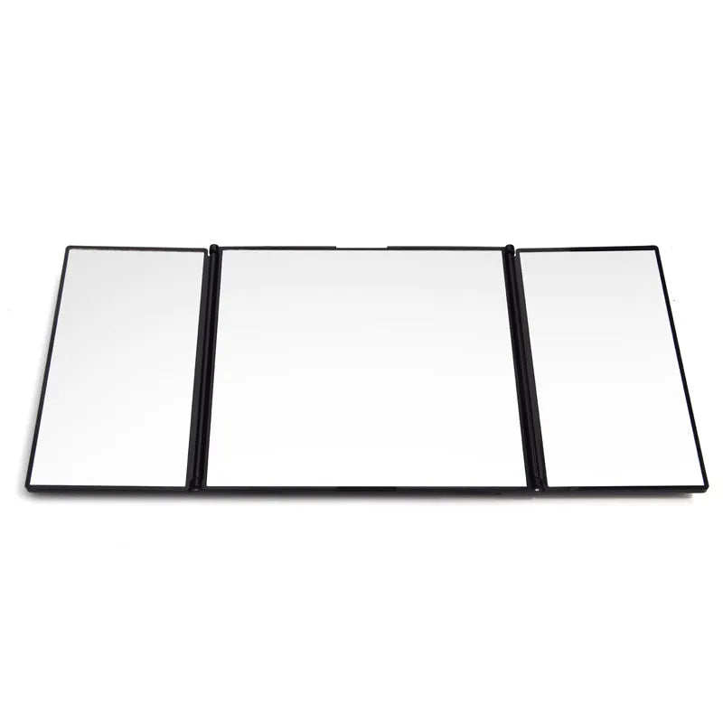 Silver folding car makeup mirror shown closed and opened, highlighting its compact and large glass sizes.