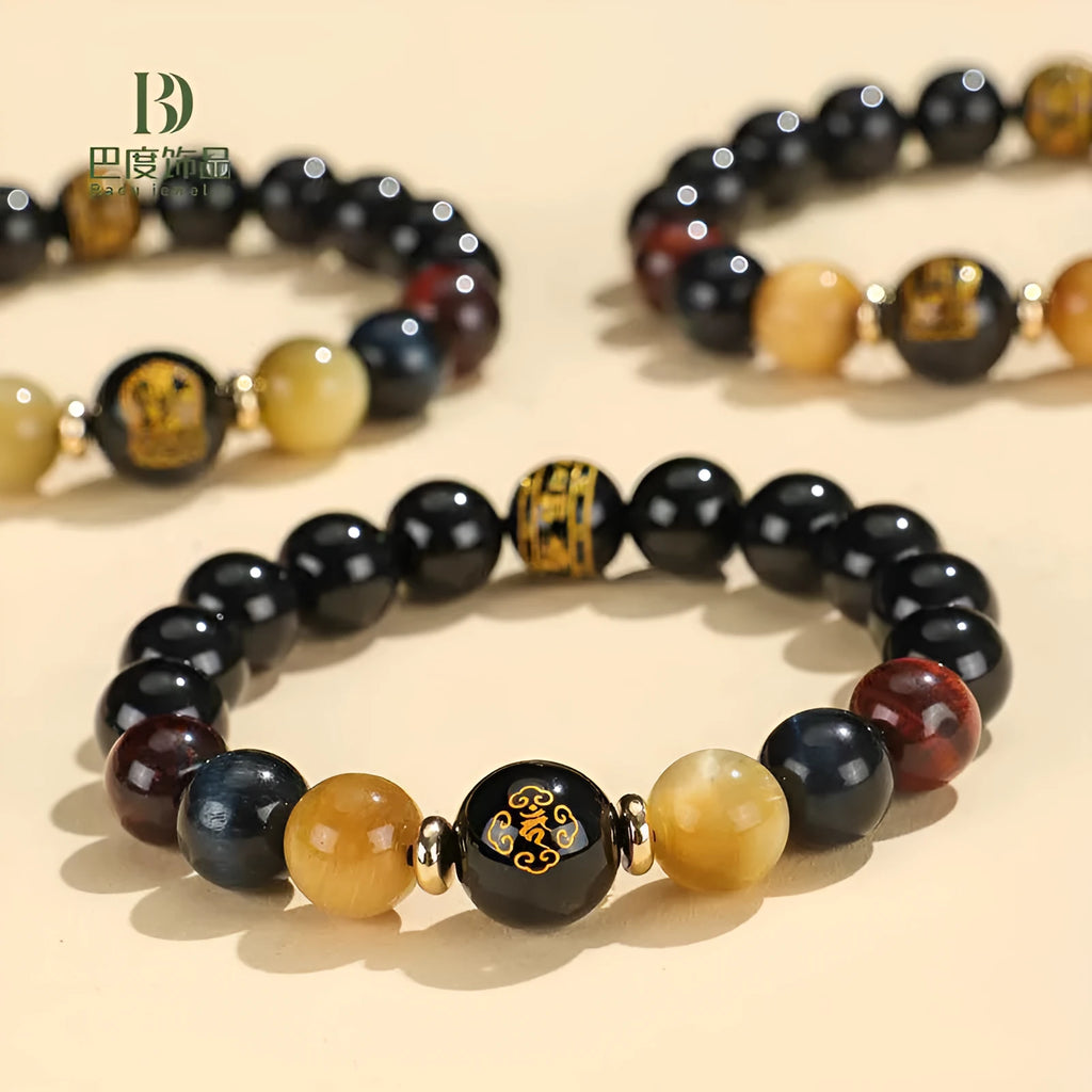 Black agate zodiac animal beaded bracelet with gold, blue and red tiger eye stones