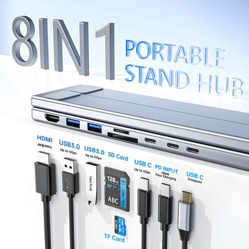 Aluminium folding laptop stand with integrated 8-in-1 docking hub ports and a short cable.