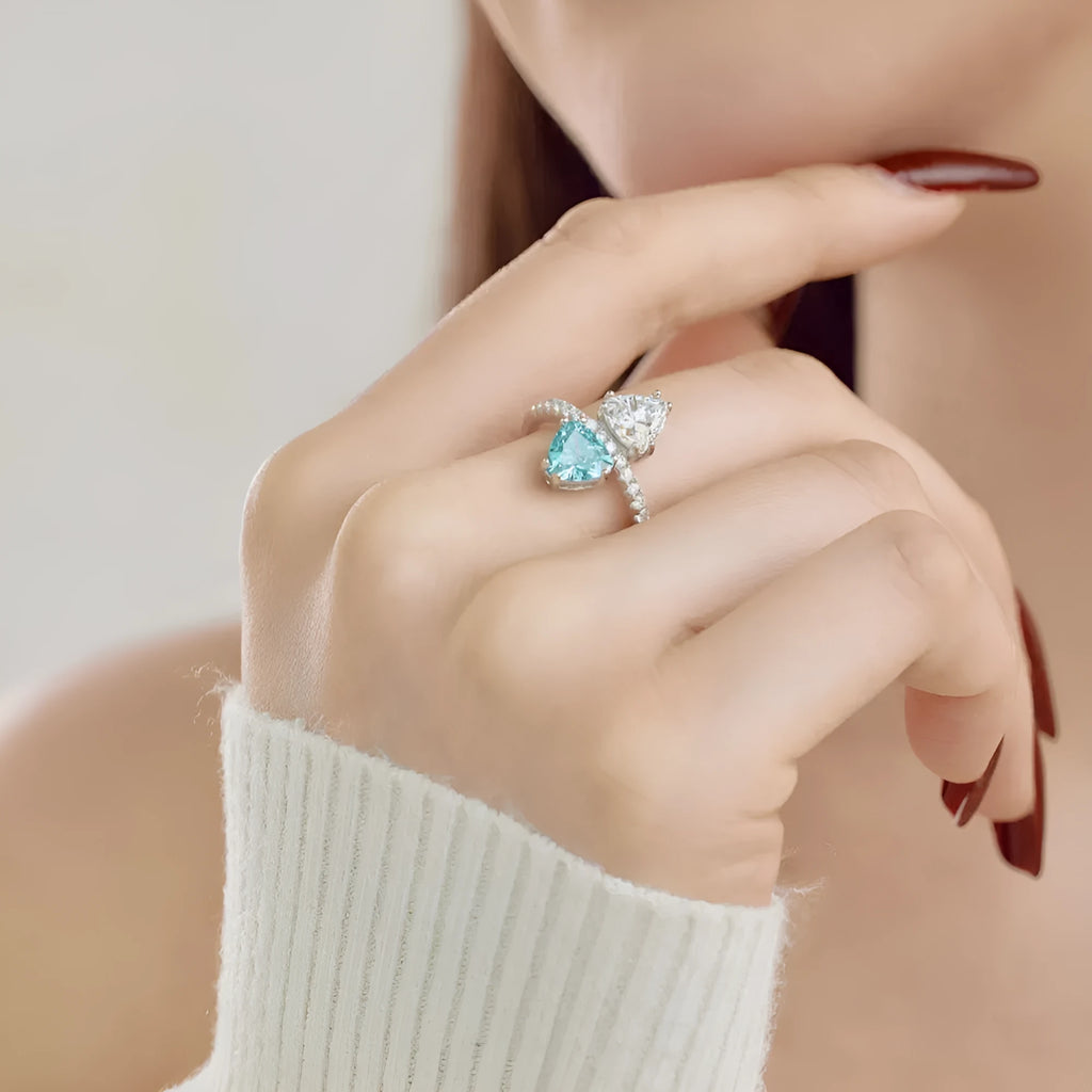 Sterling silver geometric ring with two-colour zircon inlay, Platinum Blue Diamond colour, on white background