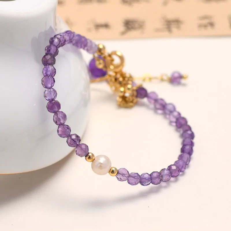 Chinese style women's bracelet with diamond-shaped amethyst crystal beads and electroplated metal clasp