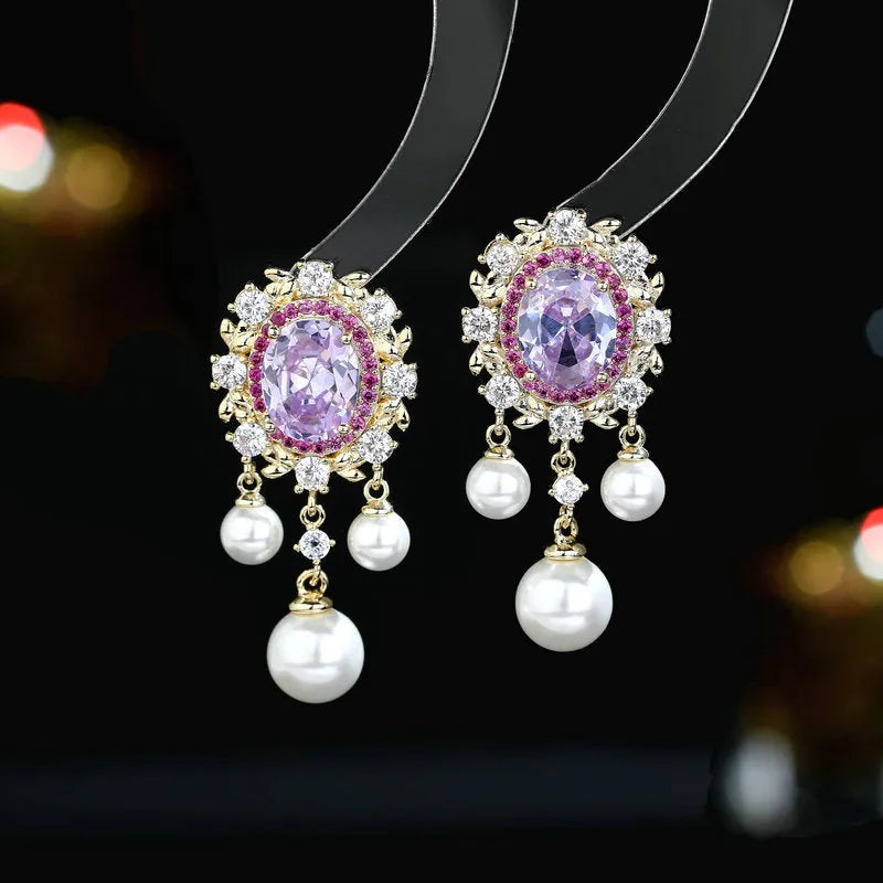 Oval geometric earrings with zircon inlay and tassel detailing in light purple colour