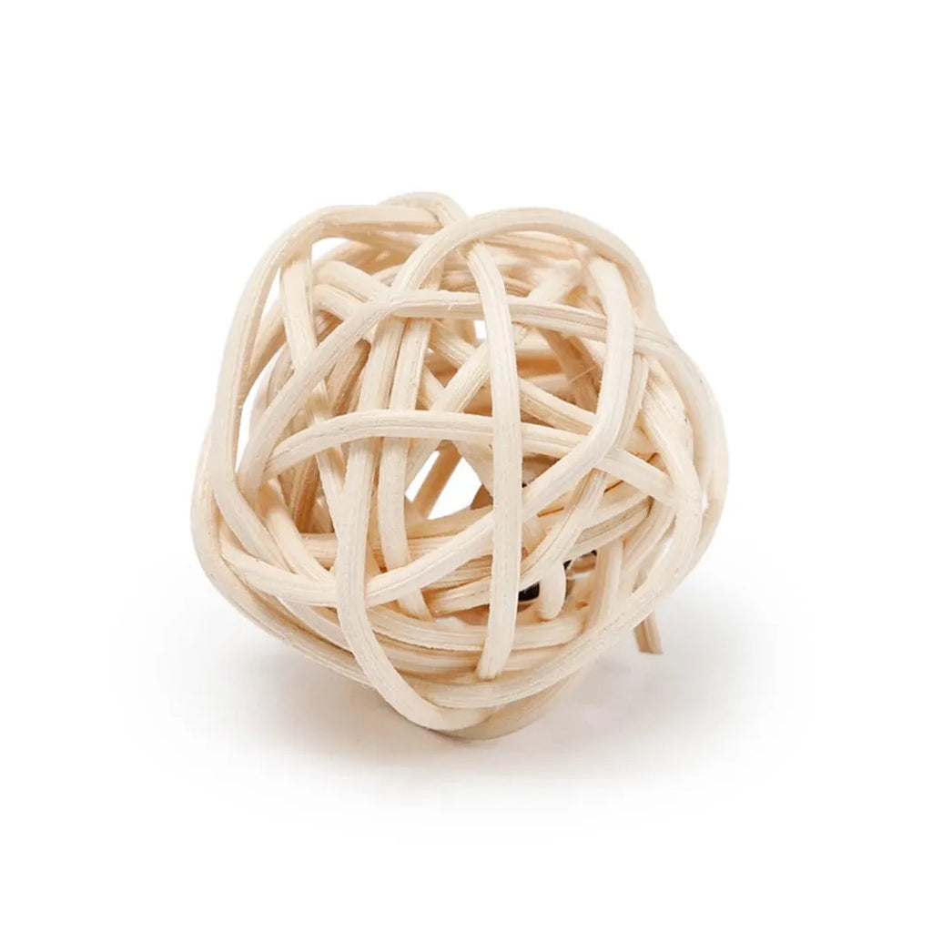 Two cat toy balls: one rattan ball and one faux feather ball with bell on a plain background.