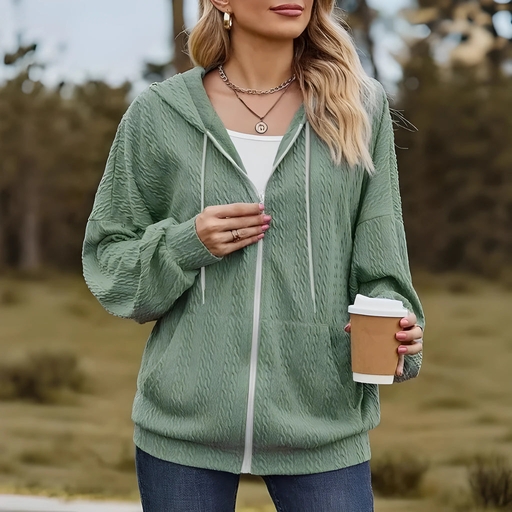 Green women's hooded casual coat with full front zipper, long sleeves, and loose fit.