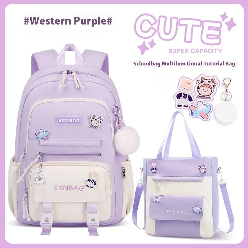 Pink waterproof Oxford cloth school backpack for girls with curved shoulder straps.