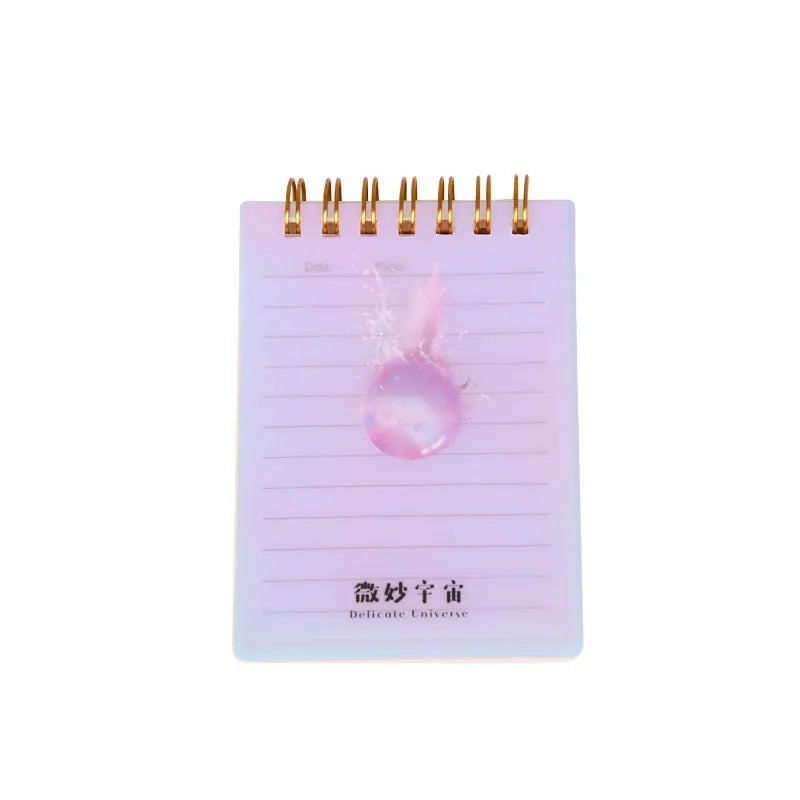 A7 rollover coil pocket notebook in four colours with spiral binding and PP cover
