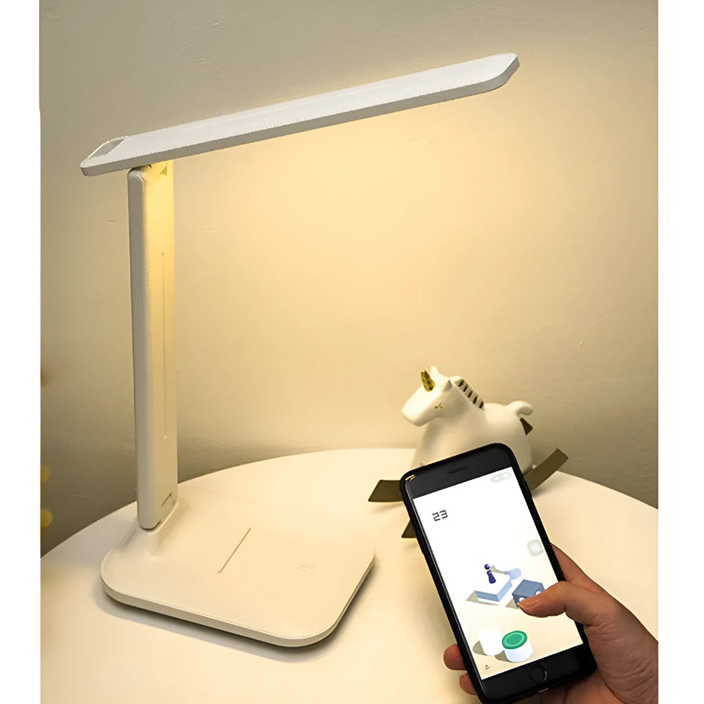White plastic USB rechargeable bedside lamp with touch dimming for children's bedrooms.