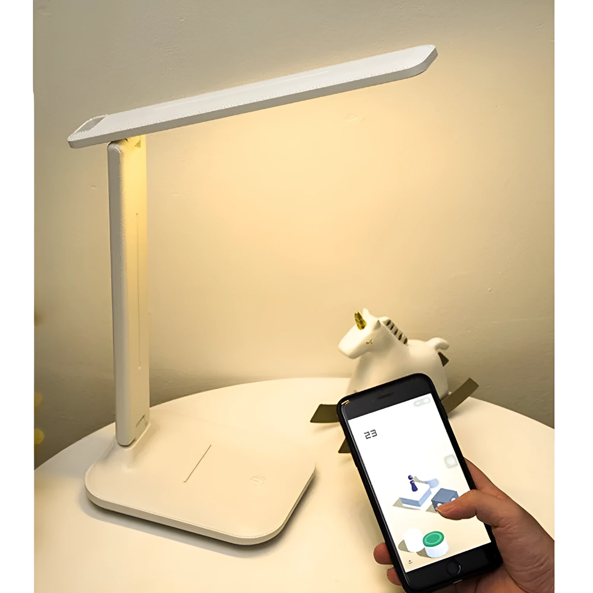 White plastic USB rechargeable bedside lamp with touch dimming for children's bedrooms.