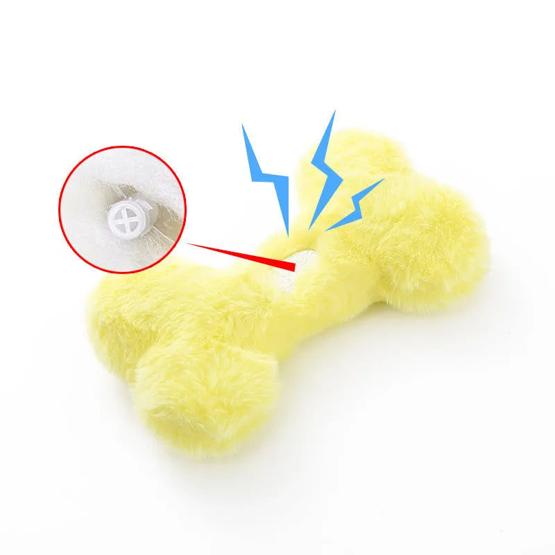 Plush love bone dog toy with squeaker in blue, pink, or yellow colours for interactive play