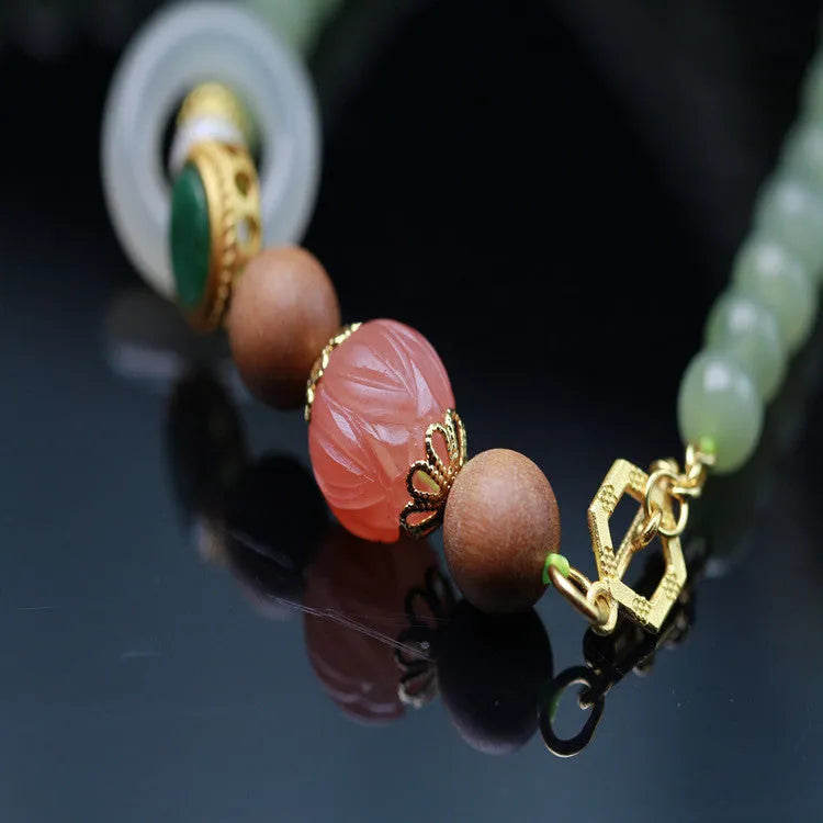 Natural Hetian jade and red lotus beads necklace and bracelet set with white sandalwood and beeswax.