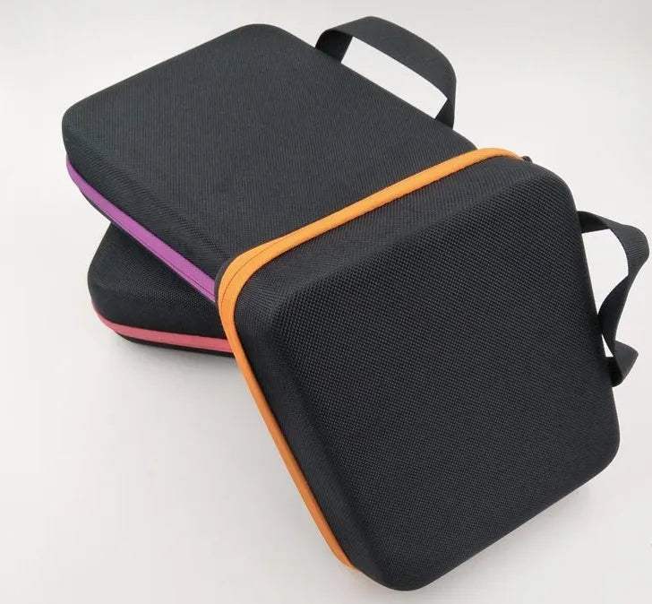 Red EVA essential oil storage bag with 30 compartments hanging on wall