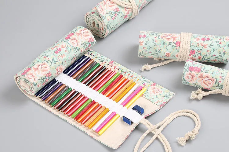 Rolled canvas pencil wrap with elastic bands holding coloured pencils, in 48-slot configuration