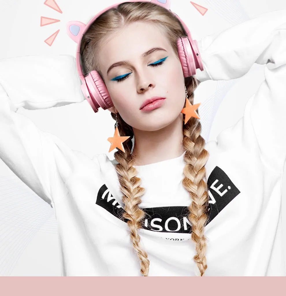 Luminous Bluetooth wireless headphones in pink white colour with high imitation protein earmuffs and braided cable