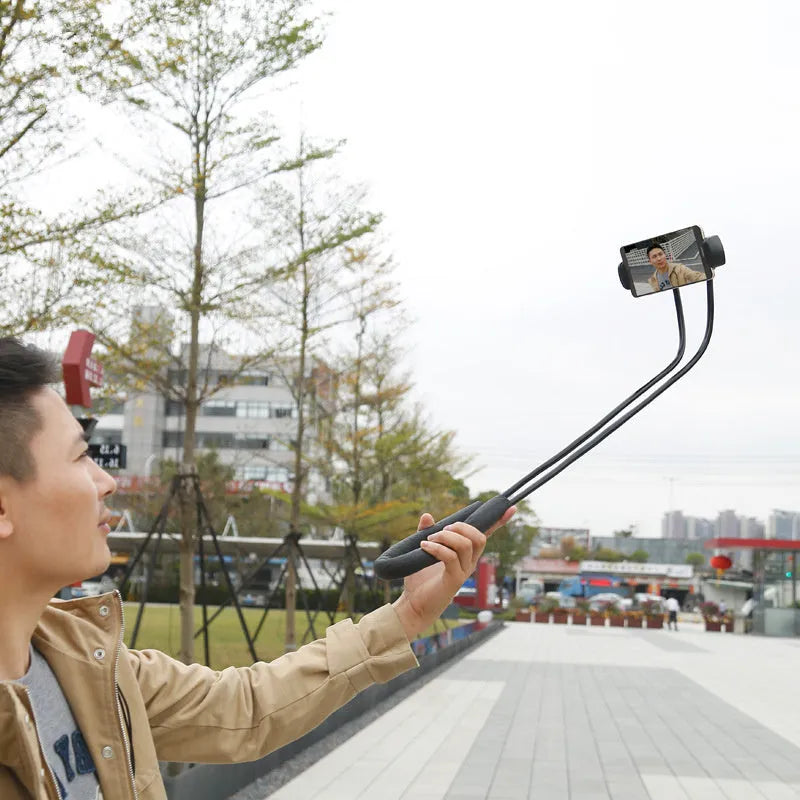 Baseus flexible 360-degree adjustable phone holder with shockproof bubble support on a grey background.
