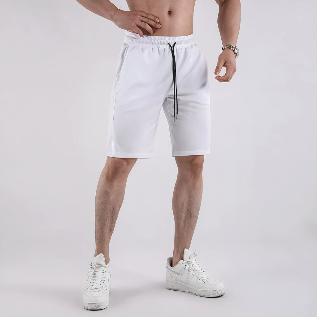Men's black quick-dry mesh capri shorts with an elastic waistband, shown in a loose, casual fit.