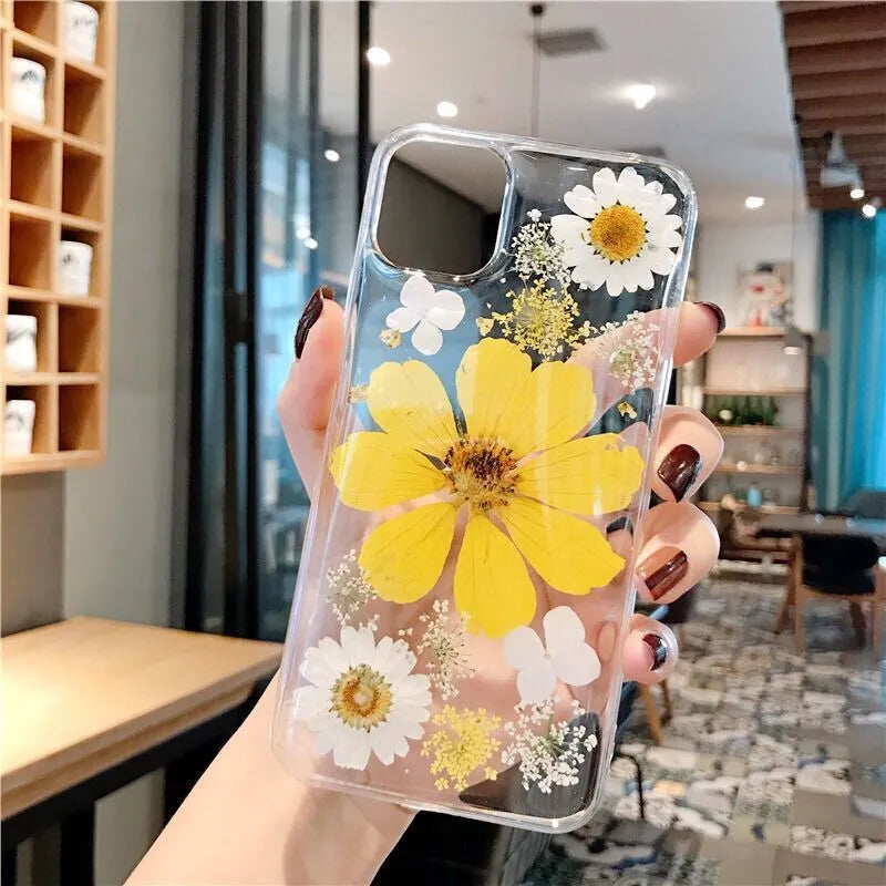 Floral iPhone case with large pink flower pattern on TPU back cover showing camera cutouts