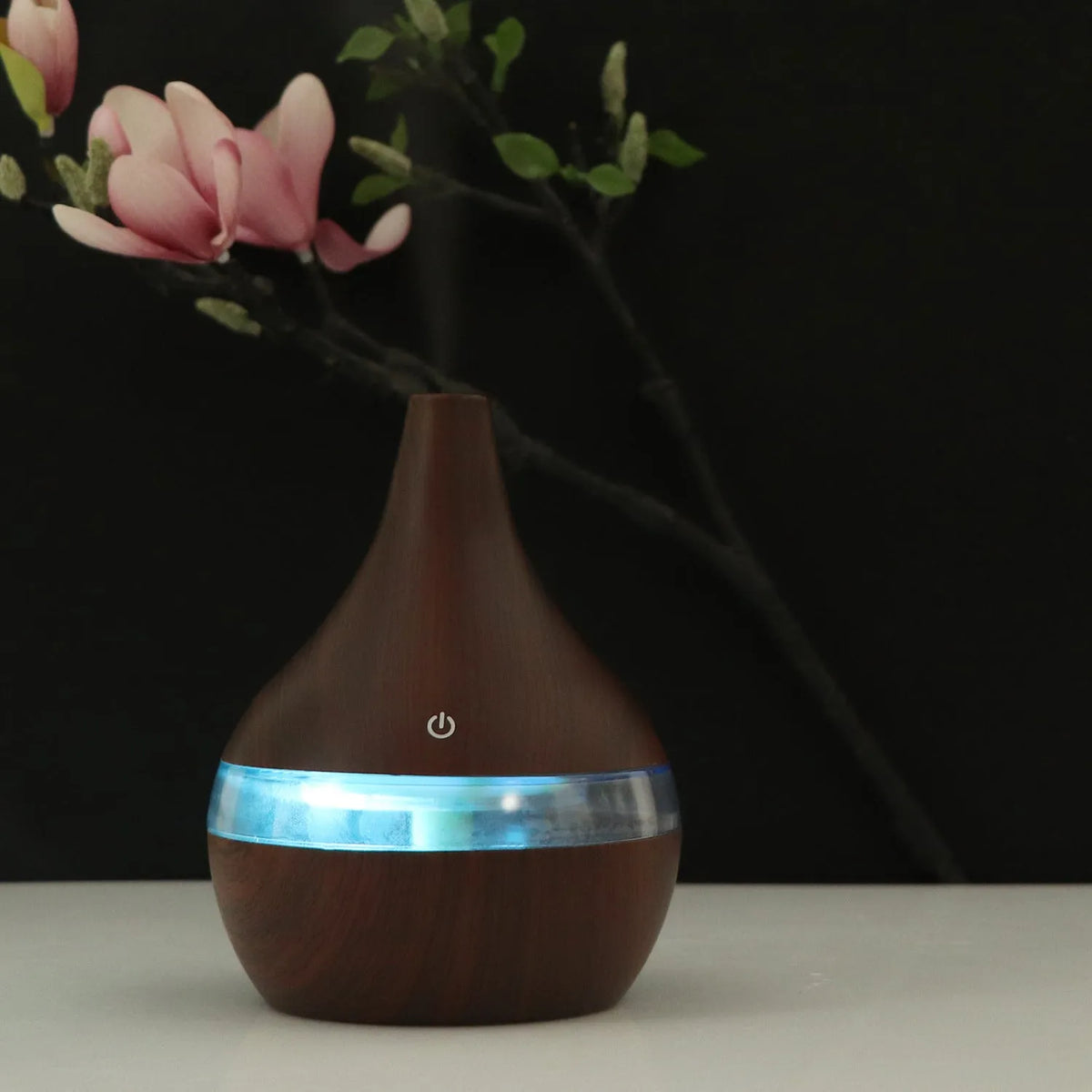USB mini tip air purifier humidifier in wood grain, columnar shape, less than 1L tank, one fog outlet, 2-8 hour timer.