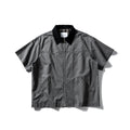 Loose fit grey washed denim short sleeve shirt overalls on a hanger
