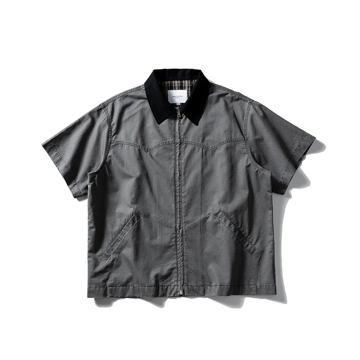 Loose fit grey washed denim short sleeve shirt overalls on a hanger