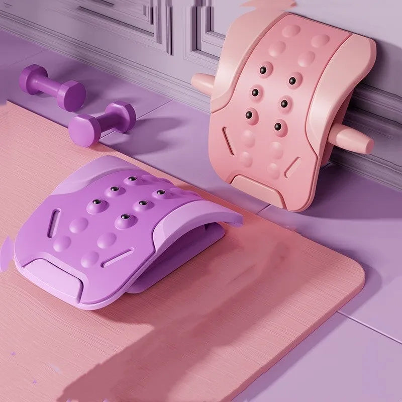 Lumbar traction tensioner in pink PP and EVA construction for yoga and fitness back stretching