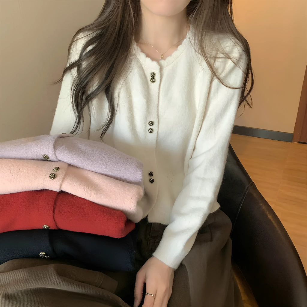Women's long-sleeved acrylic fibre cardigan coat in milky white colour showing regular fit