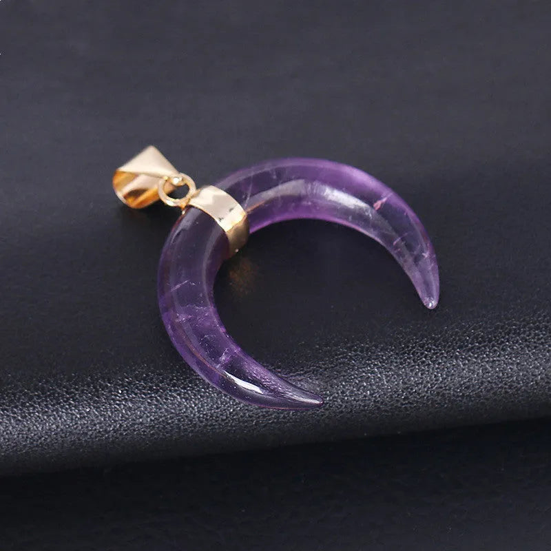 Natural stone moon pendant necklace with electroplated copper chain, shown in pink and purple colour options.
