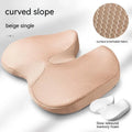 Curved wedge seat cushion for tailbone support in car, shown in beige colour with memory foam interior