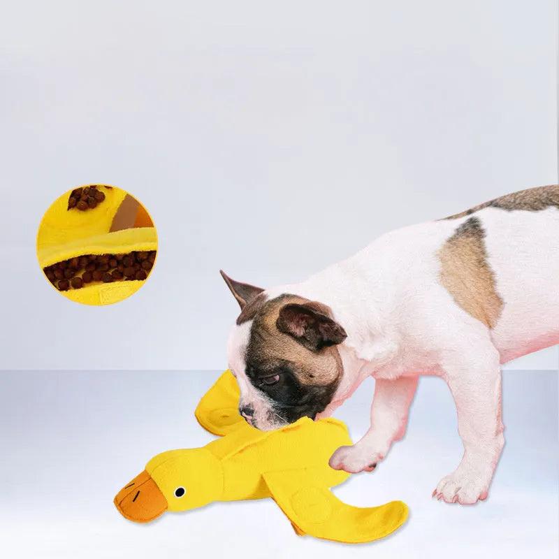 Yellow teddy duck dog toy with squeaker and treat compartment for training and dental care
