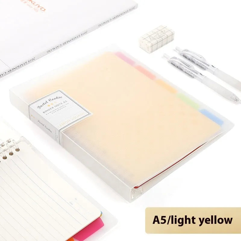 Refillable loose-leaf spiral notebook in B5 size with a pastel blue PP cover and lined pages.