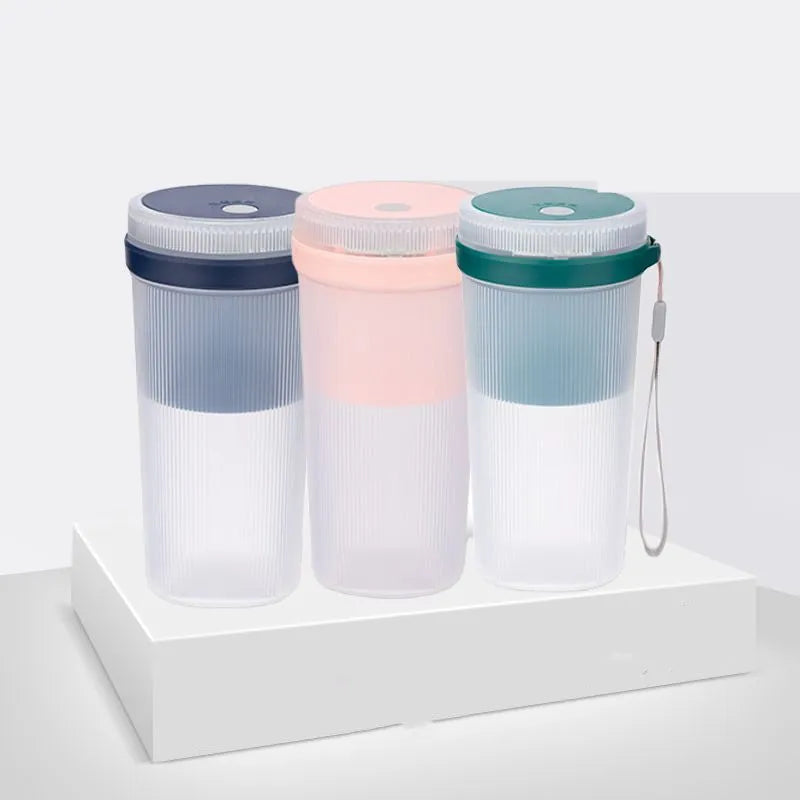 Blue portable blender cup with USB charging cable and stainless steel blending blades