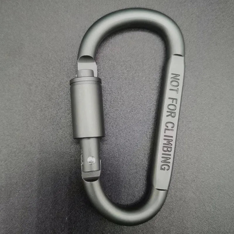 Aluminium D-type screw-lock carabiner in red, showing its 8cm size and flat-sided shape.
