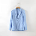 Men's thin solid colour linen coat with stick pockets on a hanger.