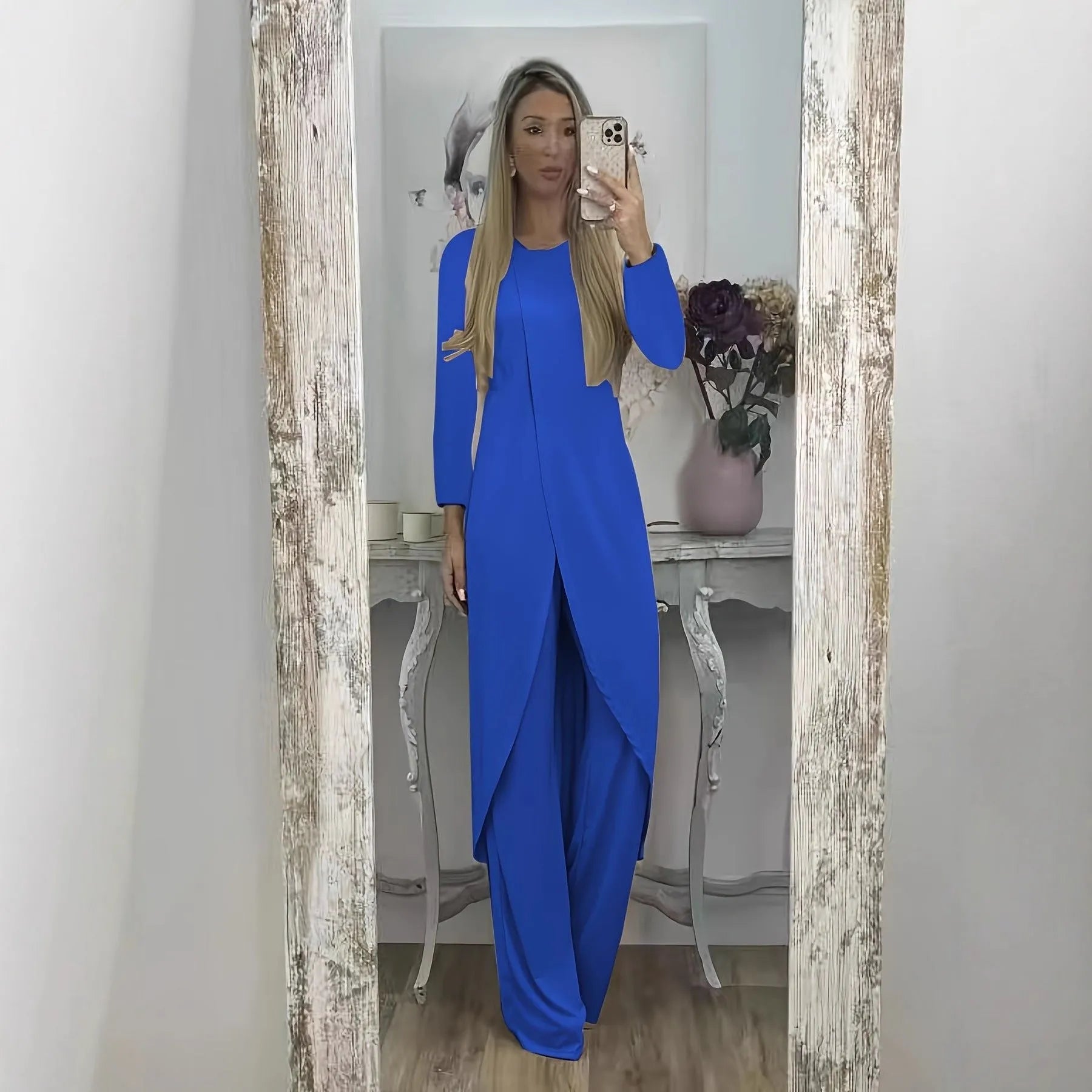 Women's casual two-piece lounge set showing long sleeve top and trousers in loose fit