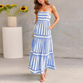Long striped backless summer dress with square neckline and side pockets on a mannequin