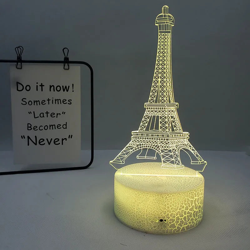 Eiffel Tower shaped table lamp with multi-colour 3D visual slide design and acrylic lampshade.