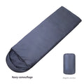 Navy blue envelope camping sleeping bag for adults on a neutral background.