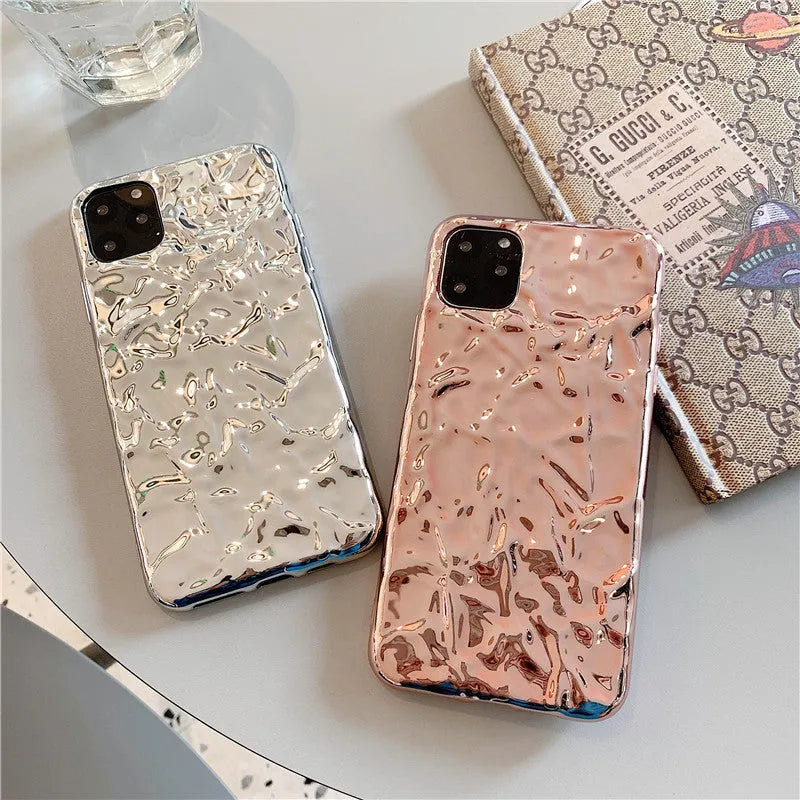 Rose Gold and Silver electroplated TPU folded back cover case for iPhone on a table