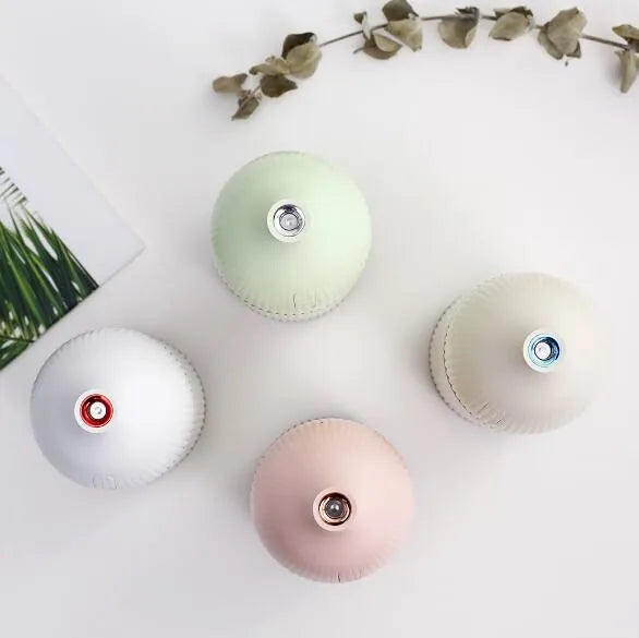 White ultrasonic aromatherapy diffuser and air humidifier with LED light, 300ml capacity, dimensions 80x80x155mm.