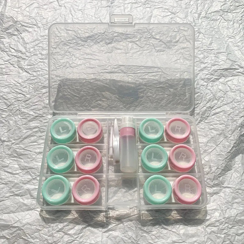 Rectangular contact lens case in various colour combinations including black white and pink white