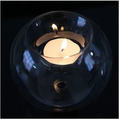 Handmade round hollow glass candle holder with clear glass construction