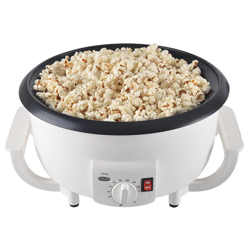 White oblate home coffee bean roasting machine with 750g capacity on a kitchen counter