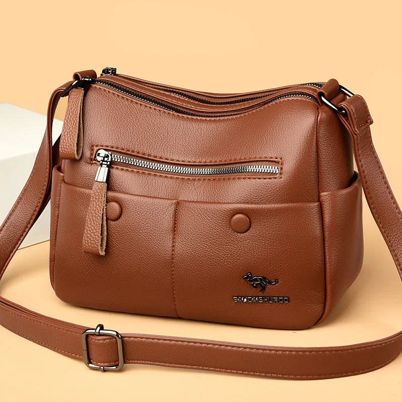 Soft PU leather crossbody bag in horizontal square shape with stitching details