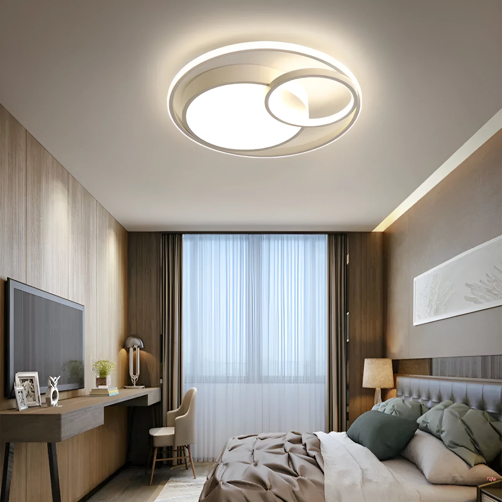 Modern minimalist round LED ceiling light in white with wrought iron frame and acrylic shade.