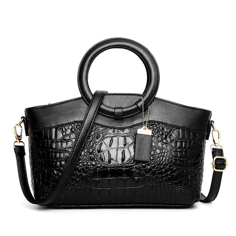 A casual fabric shoulder bag for women in multiple colours, showing zipper pockets and a handle.
